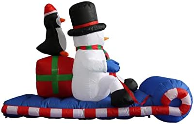 Комплект от две украса за Коледното парти, включва в себе си 6-крак коледни надуваеми пингвини, ловящих бяла мечка, и 6-крак коледа