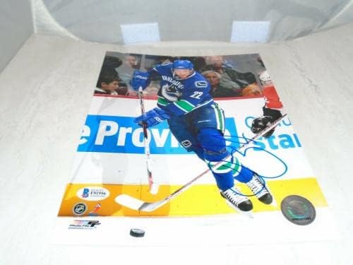 Даниел Sedin подписа договор с Ванкувър Канъкс 8x10 Снимка с автограф от PSA/DNA COA 1A - Снимки на НХЛ с автограф